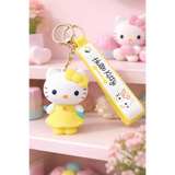 3D PVC Figure Keychain - Hello Kitty - Kitty Yellow Dress Holding Pen Book