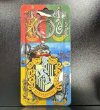PVC Keychain - Harry Potter - Hufflepuff Crest - foto real del paquete