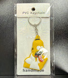 PVC Keychain - The Simpsons - Homer Eating Pizza - foto real del paquete