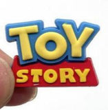 Crocs Charm - Toy Story - Logo Blue And Red Yellow Letters