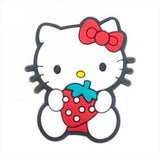 Crocs Charm - Hello Kitty - Holding A Large Strawberry