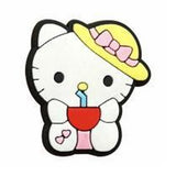 Crocs Charm - Sanrio - Hello Kitty With Yellow Sunhat Holding A Drink