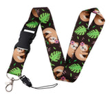 Lanyard - Sloths with Pink Flowers and Green Leaves on a Black Background