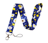 Lanyard - Blue lanyard with white and yellow daisies - DESIGN