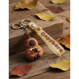 3D PVC Figure Keychain - Capybara - Holding Drumstick With Baby