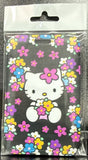 ID Card Badge Holder - Sanrio - Hello Kitty With Flowers On Black - foto real del paquete