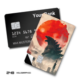 Godzilla silhouette against red sun card skin sticker