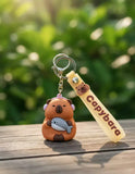 3D PVC Figure Keychain - Capybara - With Headphones Holding Fish