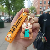 3D PVC Figure Keychain - Hoppers Operación Castor - Hopper Holding Smartphone