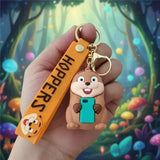 3D PVC Figure Keychain - Hoppers Operación Castor - Hopper Holding Smartphone