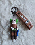 3D PVC Figure Keychain - Personajes De Kaws Companion - Brown Companion Holding Blue Figure