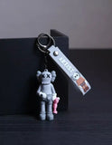 3D PVC Figure Keychain - Personajes De Kaws Companion - Kaws Companion Holding Pink Toy