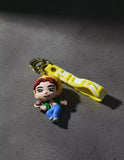 3D PVC Figure Keychain - KPop Demon Hunters - Hun Yellow Hat Holding Mic