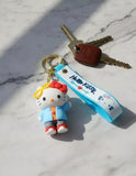3D PVC Figure Keychain - Hello Kitty - Kitty Blue Jacket Glasses Waving