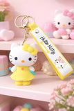 3D PVC Figure Keychain - Hello Kitty - Kitty Yellow Dress Holding Pen Book