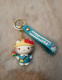 3D PVC Figure Keychain - Hello Kitty - Kitty In Hat Holding Pinwheel