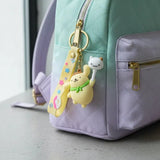 3D PVC Figure Keychain - Pompompurin De Hello Kitty - Pompompurin Holding Cat Lollipop