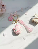 3D PVC Figure Keychain - Pompompurin De Hello Kitty - Pompompurin Pink Sakura