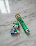 3D PVC Figure Keychain - Snoopy - In Green Uniform With Cart
