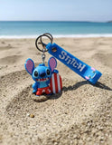 3D PVC Figure Keychain - Lilo & Stitch - Stitch Holding Striped Surfboard