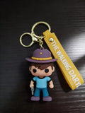3D PVC Figure Keychain - The Walking Dead - Carl Grimes In Hat Holding Pistol