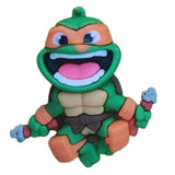 3D PVC Figure Keychain - Las Tortugas Ninja - Chibi Michelangelo Happy Nunchaku
