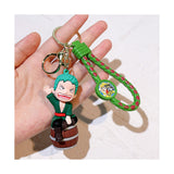 3D PVC Figure Keychain - One Piece - Roronoa Zoro Chibi Sitting On Barrel