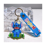 3D PVC Figure Keychain - Lilo & Stitch - Stitch Sitting On Green Candy With Yellow Hat