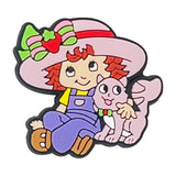 Strawberry Shortcake sitting with cat Custard product