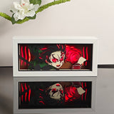 Demon Slayer Tanjiro Kamado using Hinokami Kagura anime light box — lit, front view