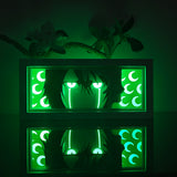 Bleach Ulquiorra Cifer with glowing green eyes anime light box — dark room atmospheric