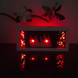 Naruto Sasuke Uchiha Mangekyō Sharingan Eyes anime light box — dark room atmospheric