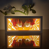 Demon Slayer Zenitsu Agatsuma intense eyes portrait anime light box — dark room atmospheric