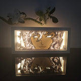 Berserk Griffith's face with flowing white hair anime light box — dark room atmospheric
