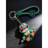 3D PVC Figure Keychain - Teenage Mutant Ninja Turtles - Chibi Michelangelo Happy Nunchaku