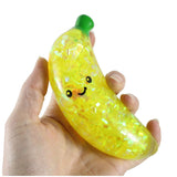 Squishy - Water and Sparkle Filled Banana Squeeze Ball (Random Face)