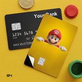 Credit Card Skin Sticker - Super Mario - Peeking Mario Yellow Background