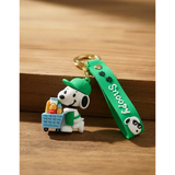 3D PVC Figure Keychain - Peanuts - Snoopy In Green Uniform With Cart
