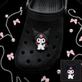 Crocs Charm - Sanrio - Kuromi Standing With Pink Skull Hood Looking Down