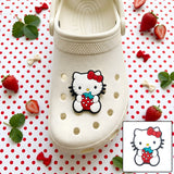 Crocs Charm - Hello Kitty - Holding A Large Strawberry