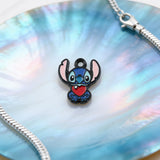 Bracelet Charm - Lilo & Stitch - Blue Stitch Holding Red Heart Black Outline Sitting