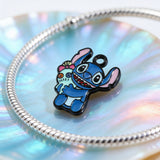 Bracelet Charm - Lilo & Stitch - Blue Stitch Sitting Holding Scrump Doll