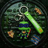 3D PVC Figure Keychain - Teenage Mutant Ninja Turtles - Donatello Chibi with Glasses and Bo Staff