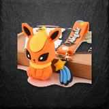3D PVC Figure Keychain - Pokémon - Flareon Sitting With A Shooting Star Charm