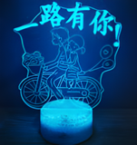 3D Illuminated Art - Couple on a tandem bicycle with the text "All the way with you!" 3D Illusion LED Night Light 16 Colors