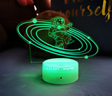 3D Illuminated Art - Astronaut in space with planetary rings 3D Illusion LED Night Light 16 Colors
