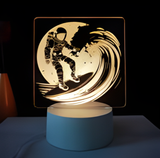 3D Illuminated Art - Astronaut Surfing 3D Illusion LED Night Light 16 Colors