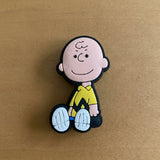 Crocs Charm - Peanuts - Charlie Brown Sitting